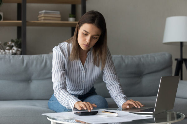 Woman calculating costs