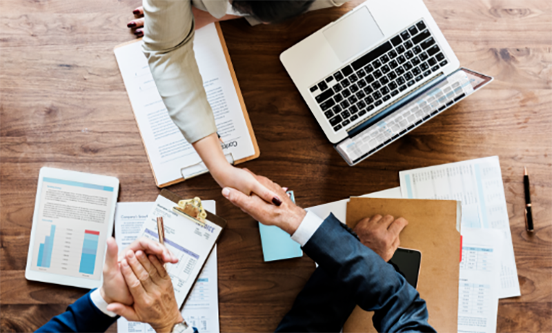 Business people shaking hands on a deal